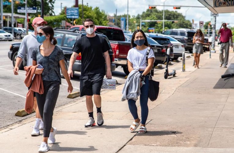 Gov. Greg Abbott issued an executive order mandating face coverings in public places in counties with 20 or more positive Covid-19 cases