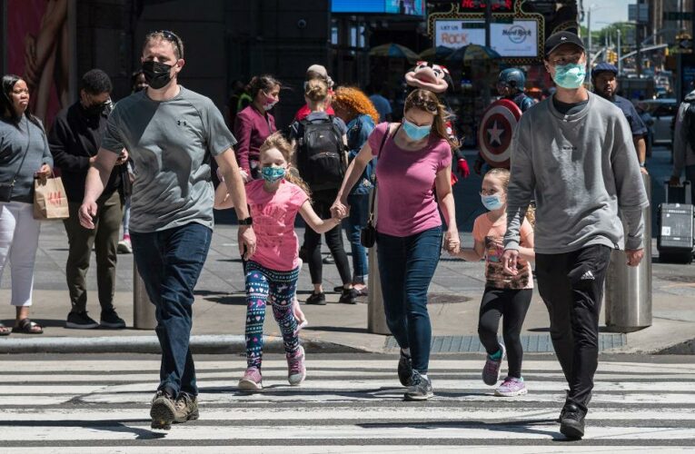 Do fully vaccinated people need to wear masks because of the Delta strain? Your Covid questions, answered