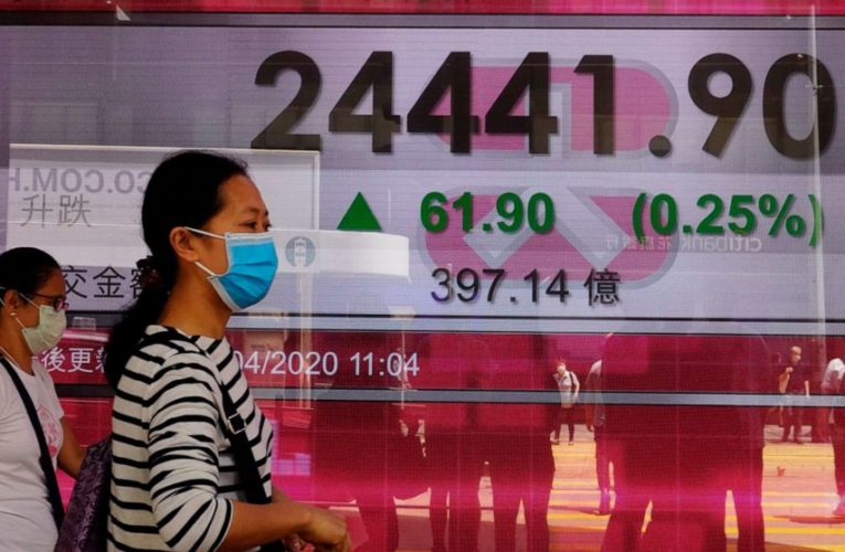 World shares mixed as Wall St rally fades, oil prices sink