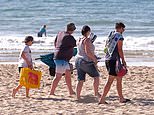 Sun-seekers ignore warnings they’ll be fined for breaking lockdown rules as they head to beaches
