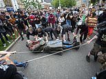 Moment Black Lives Matter protesters tear down statue of 17th century slave trader