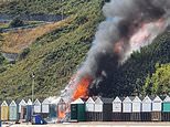 Sunbathers flee as huge fire breaks out on Bournemouth beach