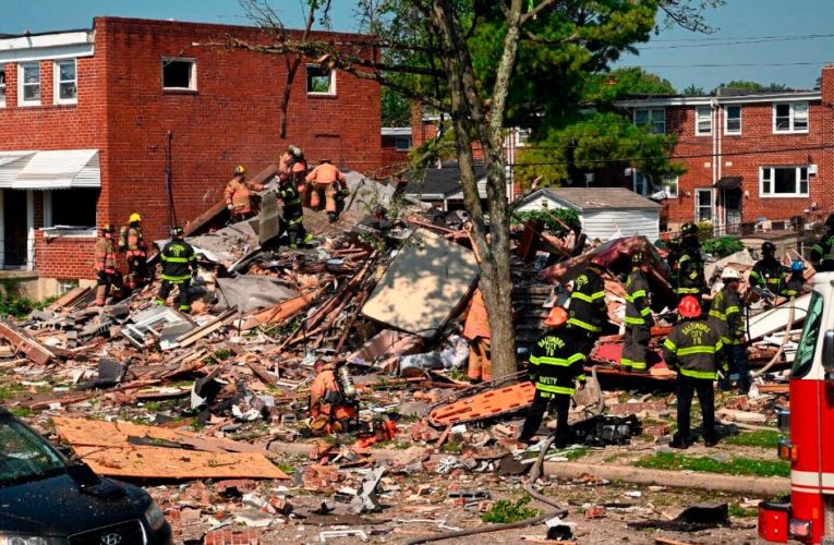 People, including children, are trapped after the blast in a residential area in Baltimore, fire officials say