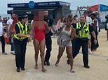Moment sunseekers are led away by police as officers break up ‘brawls’ at seasides in the UK