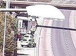 Police swoop on lorry suspected of carrying migrants on the M25 causing seven-mile tailbacks