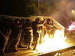 Troops fire tear gas on Beirut protesters who hurl them back as streets brim with violence