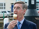 Jacob Rees-Mogg eats ice cream while wearing suit in Weymouth