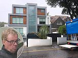 Harry Redknapp oversees a fleet of removal men as they pack up his £7m four-storey Sandbanks mansion