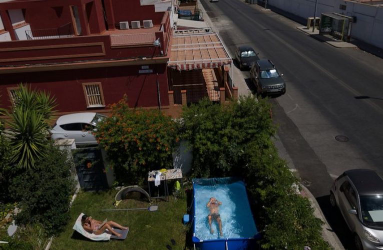 AP PHOTOS: Splash! Virus spawns portable pool fad in Spain