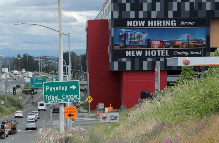 US jobless claims fall below 1 million but remain high