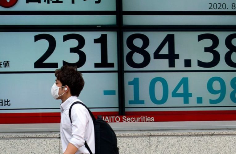 Wall Street ticks up, nudges S&P 500 again to edge of record