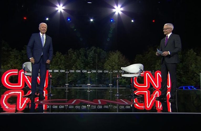 The Democratic presidential nominee calls Trump’s downplaying of the virus nearly criminal and says he’d tell Americans the truth