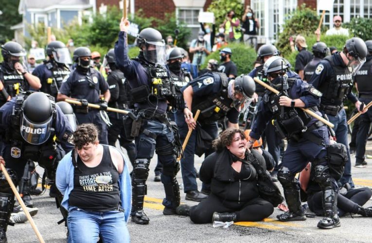 Two officers shot during protests over grand jury decision