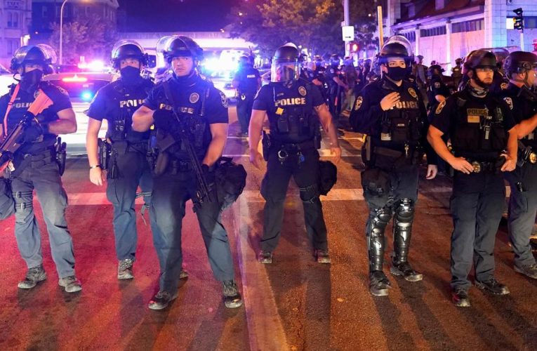 At least one officer was shot during demonstrations after public outrage over a grand jury decision not to charge officers with killing Breonna Taylor