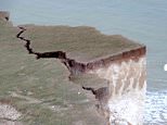 Massive chunk of Sussex cliff teeters on brink of collapse as giant crack opens up after heavy rain