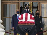 Crowds boo Donald and Melania Trump as the first couple pay their respects to Ruth Bader Ginsburg