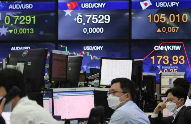 Asia slightly higher despite Wall Street slump, virus fears