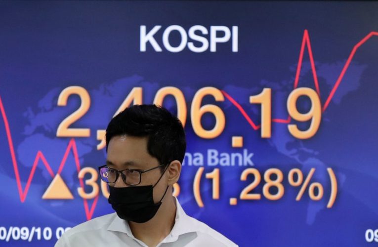 US stocks turn lower again as a wild trading week continues