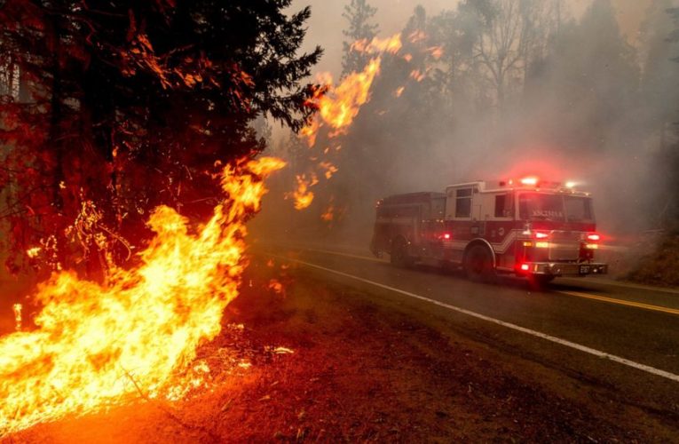 Helicopters pull more people from burning California forest