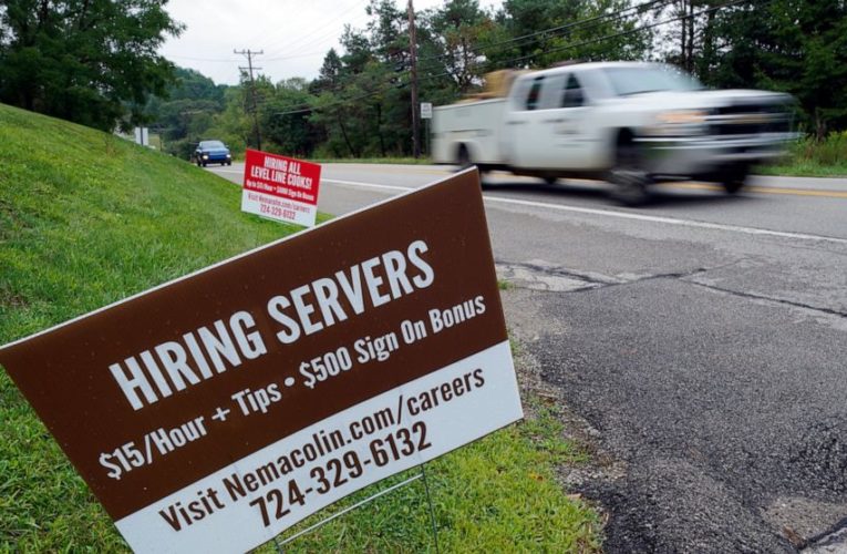 US layoffs remain elevated as 884,000 seek jobless aid