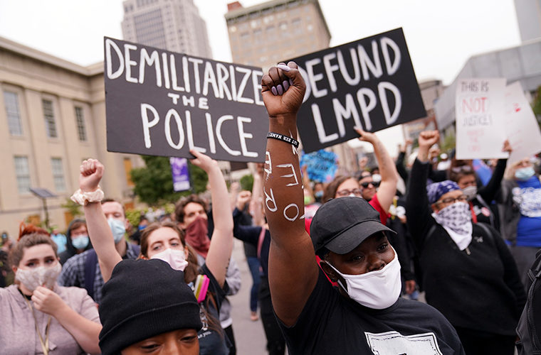 Demonstrators took to the streets after public outrage over a grand jury decision not to charge officers with killing Breonna Taylor