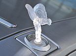 EU dimwits! Rolls-Royce’s glowing mascot is banned from lighting up under crackdown on pollution