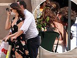 Lily James and married Dominic West passionately kiss in Rome