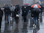 UK weather: Commuters endure miserable journey to work as Storm Barbara hits