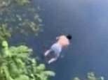 Daredevil Jon Gleason jumps 115ft into a river in Birdsboro, Pennsylvania
