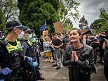 Anti-lockdown protesters clash with police in Melbourne – officers use pepper spray