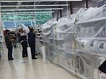 Supermarket swoop! Tesco staff in Wales COVER UP kettles and bedding on shelves under new lockdown