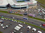Theme park set up across road from Covid test centre sparks fury