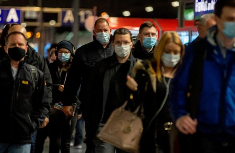 The Latest: German area goes into de-facto virus lockdown