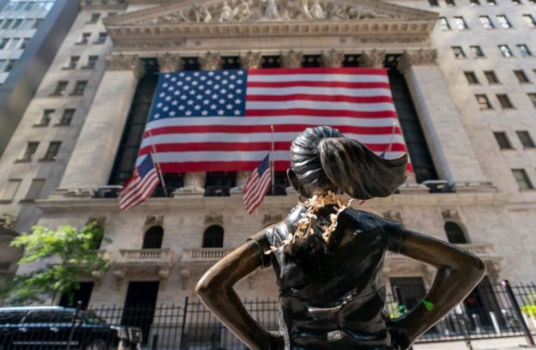 Stocks end bumpy day lower after Trump’s positive virus test