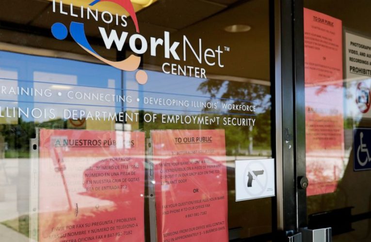 US jobless claims drop to 787,000, but layoffs remain high