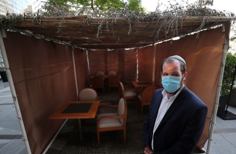 Jewish sukkah rises at base of world’s tallest tower in UAE