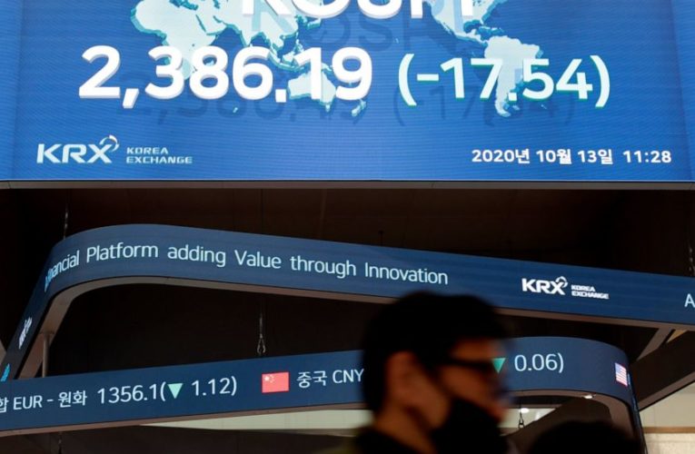 Asian shares mixed as China reports faster growth in trade