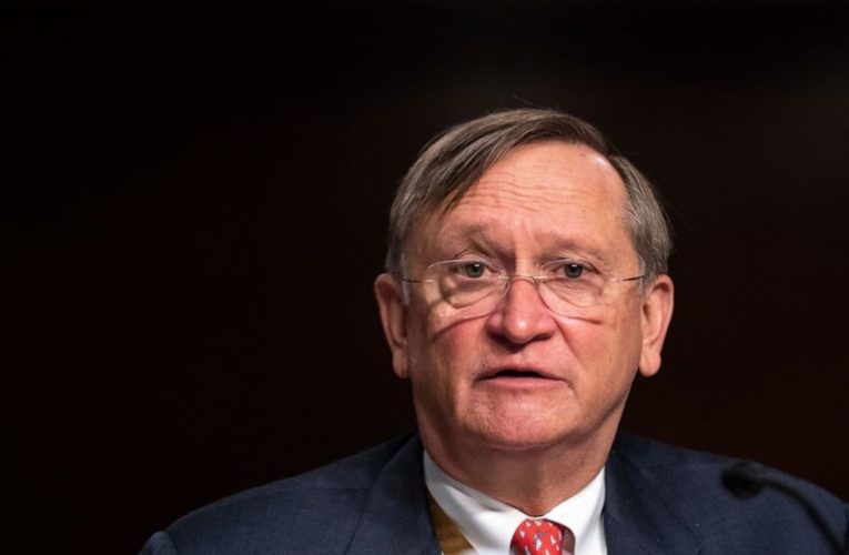 Official says vaccine expected in January, countering Trump