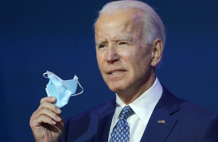 Biden takes on pandemic fight despite Trump