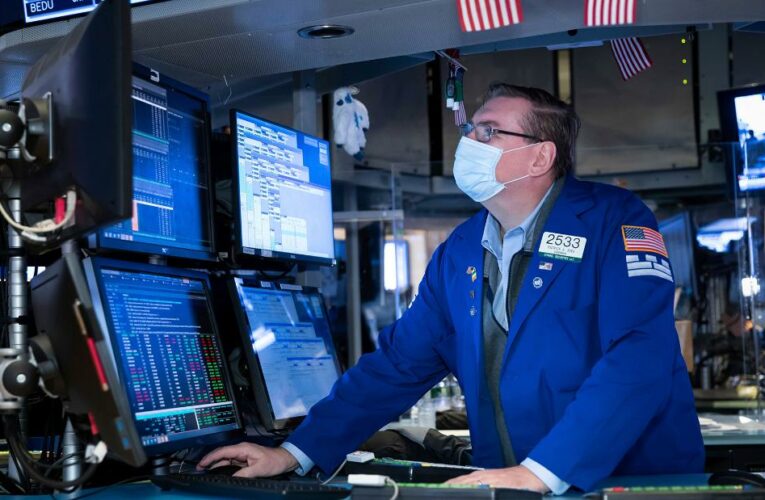 The Dow tops 30,000 for the first time ever as Biden transition begins