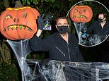 Jonathan Ross has a more subdued Halloween as he greets trick-or-treaters at his home