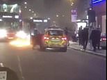 Man ‘arrested’ as car driven into police station in Edmonton, London