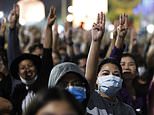 Royalists cheer King of Thailand as he opens train station while protestors rally demanding change
