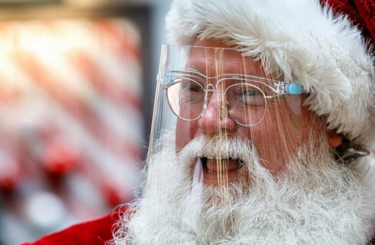 Here comes Santa Claus – with face masks and plexiglass