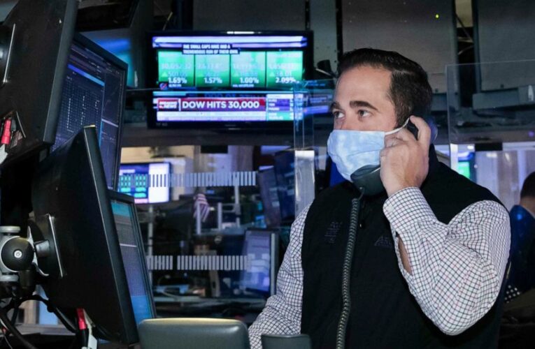 Asian shares rise after Dow crests 30,000 on vaccine hopes