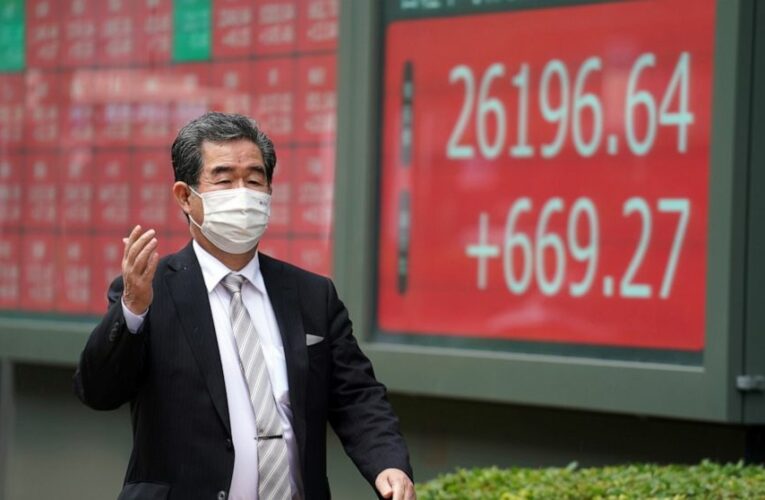 Dow crests 30,000 points on vaccine hopes, Biden transition