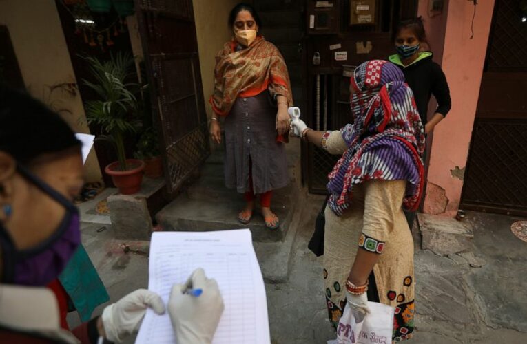 The Latest: India’s capital mulls curfew amid virus surge