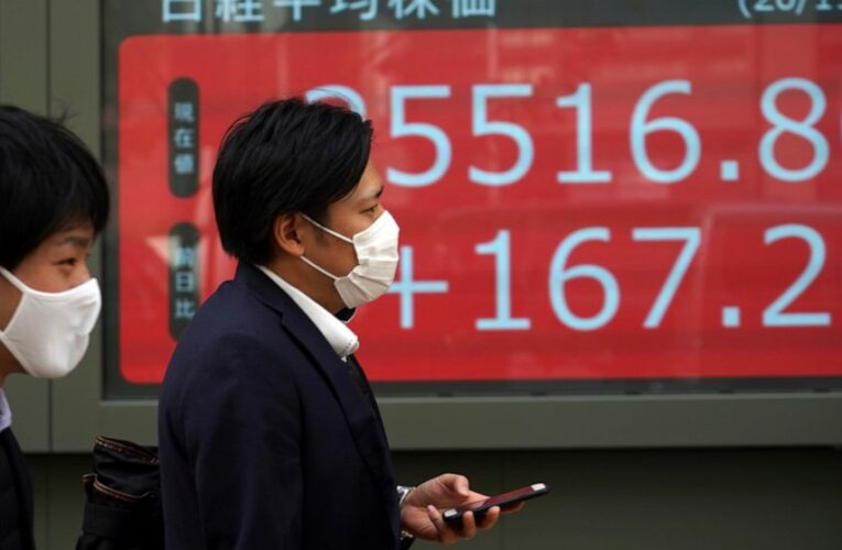 Asian shares slip on faltering hopes for COVID vaccines