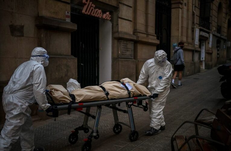 Spain’s mortuary workers endure the daily march of death