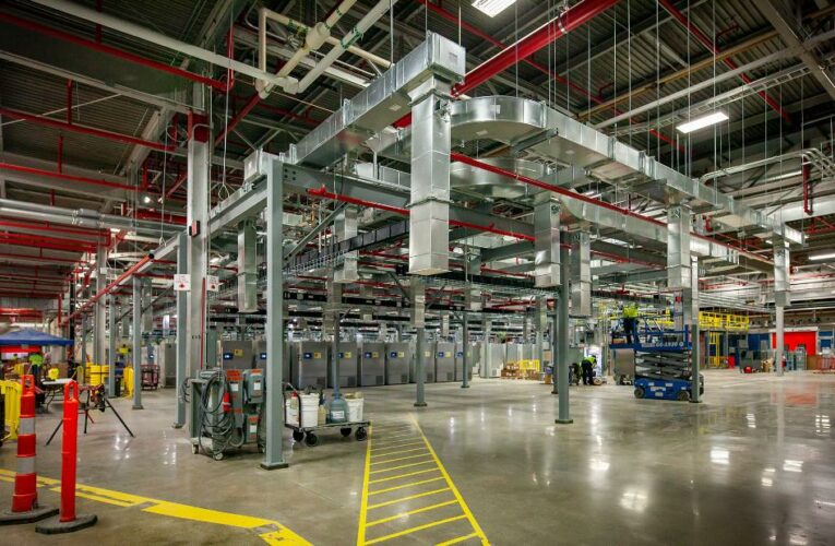 Trucks are expected to roll out of the Michigan facility tomorrow morning, the company says